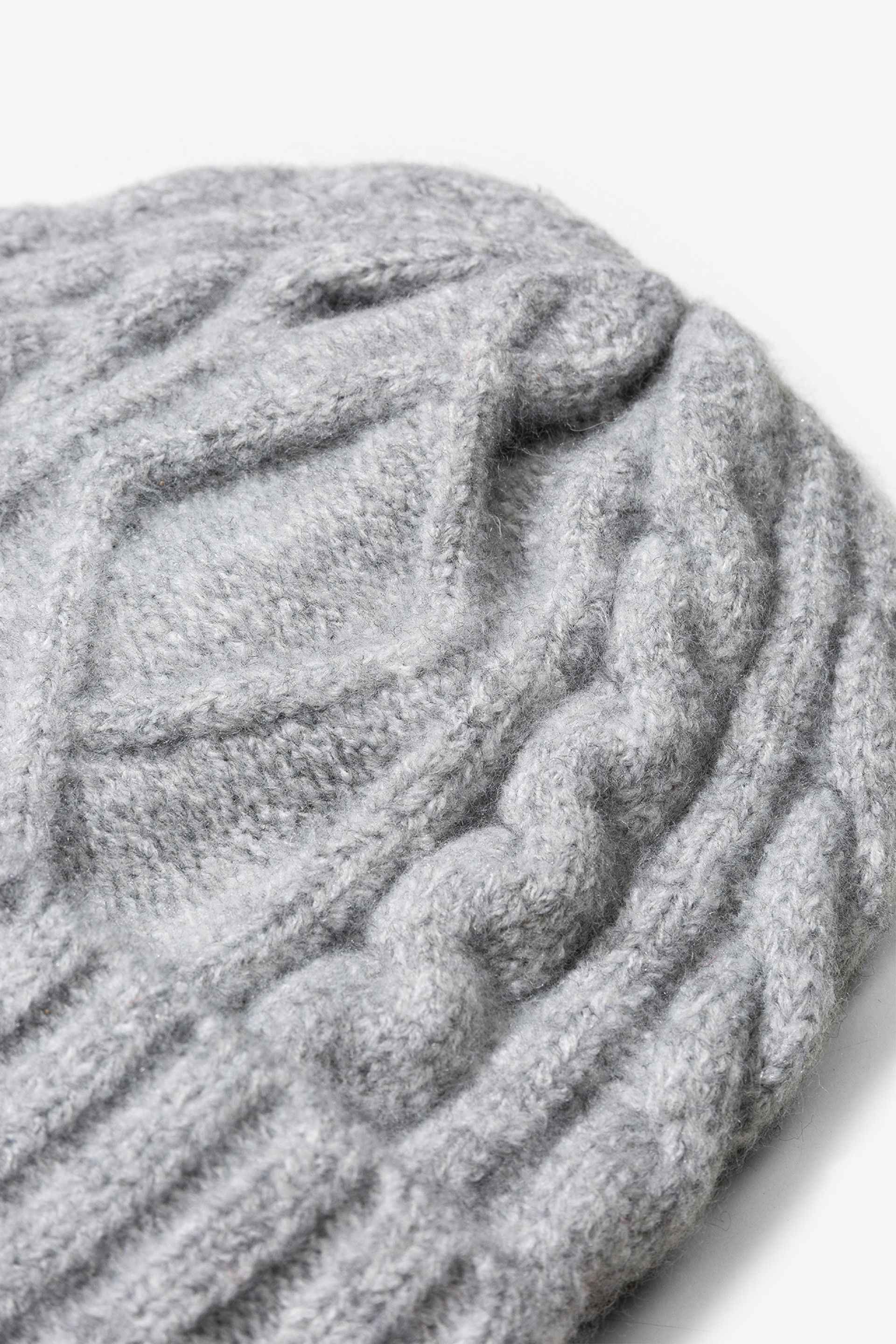 FLÄTAD DAMMÖSSA DITA